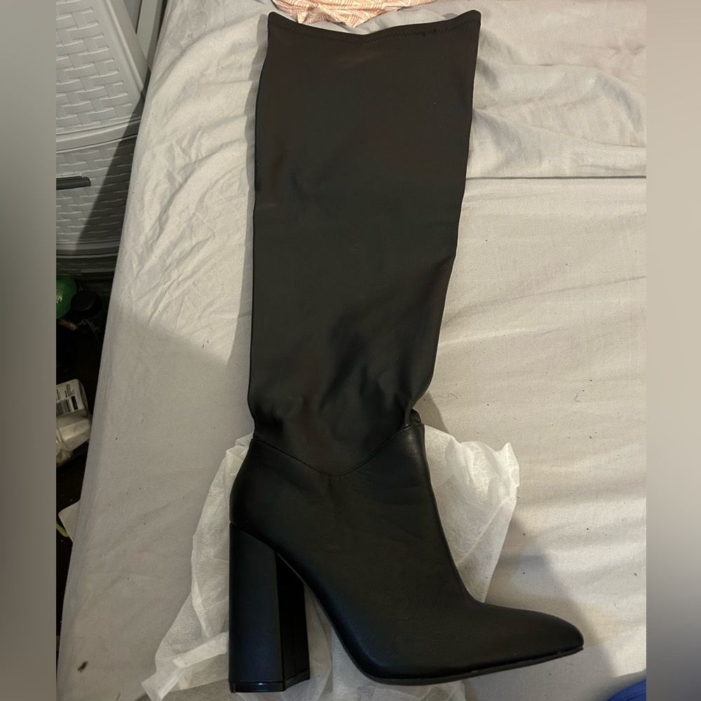 Never been worn black knee boots